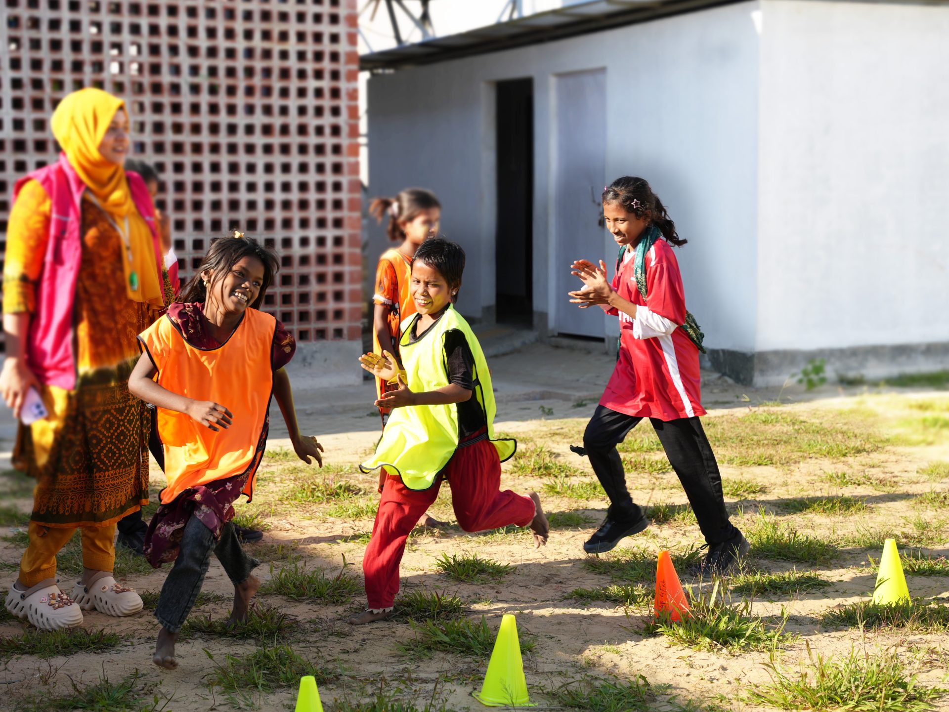 Play for Protection, Cox’s Bazar, Bangladesh. Rohingya girls running