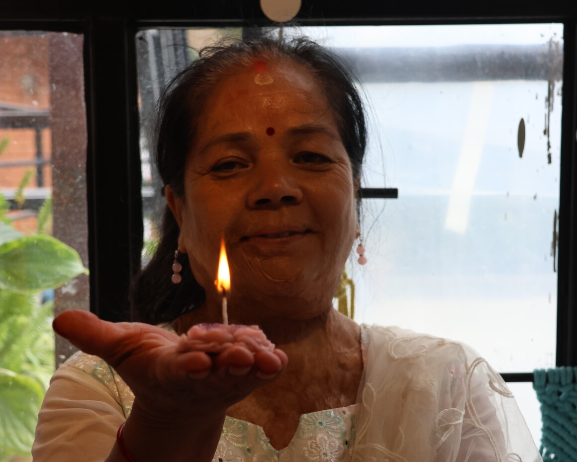 Burn survivor crafts candles