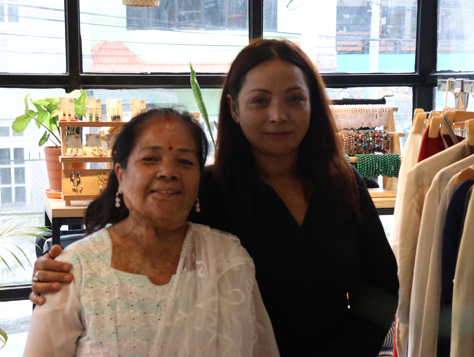 Burn survivors working in craft shop